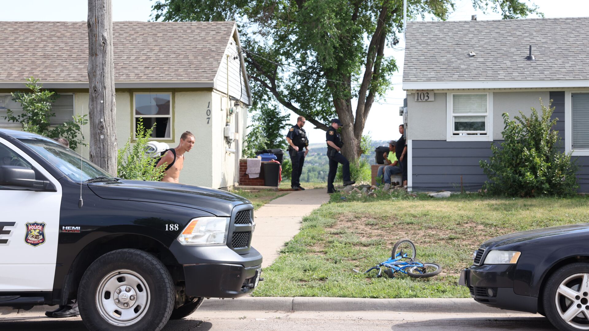 Police speak with residents